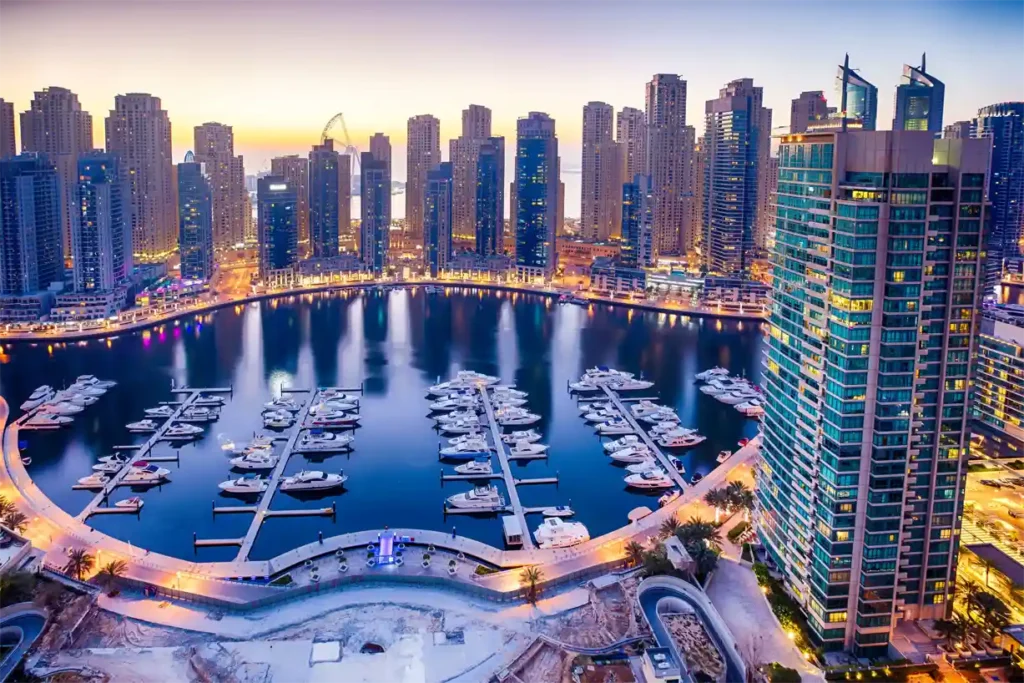 Aerial view of Dubai Marina with skyscrapers and luxury yachts