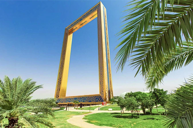Iconic Dubai Frame structure with landscaped park surroundings